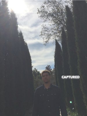 cover image of Captured